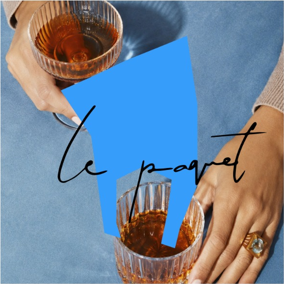 LE PAQUET identity with a blue geometric bag and hand-drawn lettering over a cocktail photograph